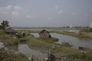 Looking across Fish farms to brick making Kilns