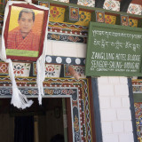 Photo of the king and a Phallas over the hotel door