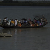 A local ferry fully loaded.