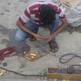 electial work on a movie set at the Ghat