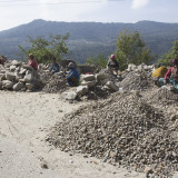 Making gravel by hand on the side of the road